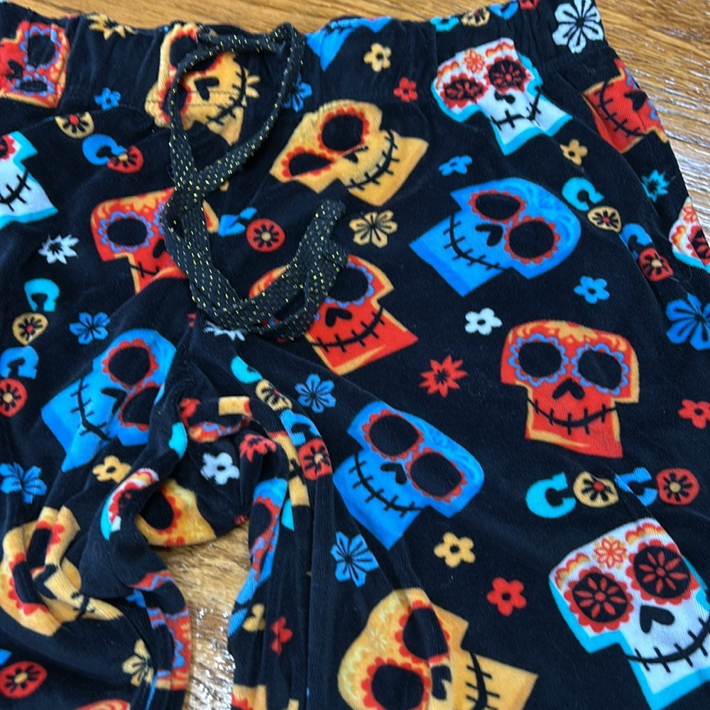 Disney Pixar Coco theme velour pajama pants. Black w/colorful skulls. Size Large - Picture 2 of 10